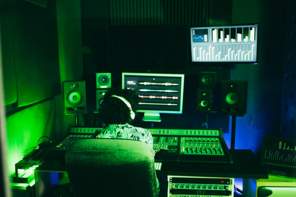 Music engineer working inside production studio
